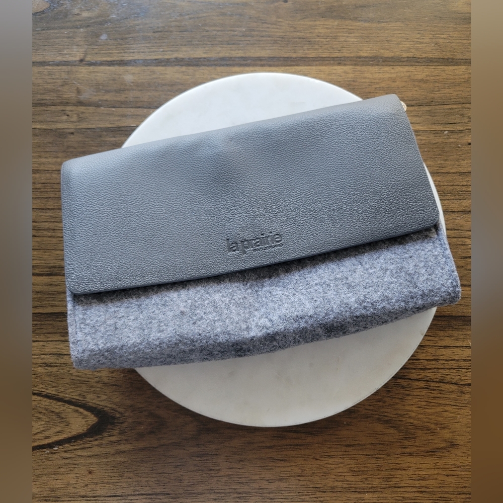 La Prarie felt bag